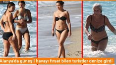Alanya’da güneşli havayı fırsat bilen turistler denize girdi